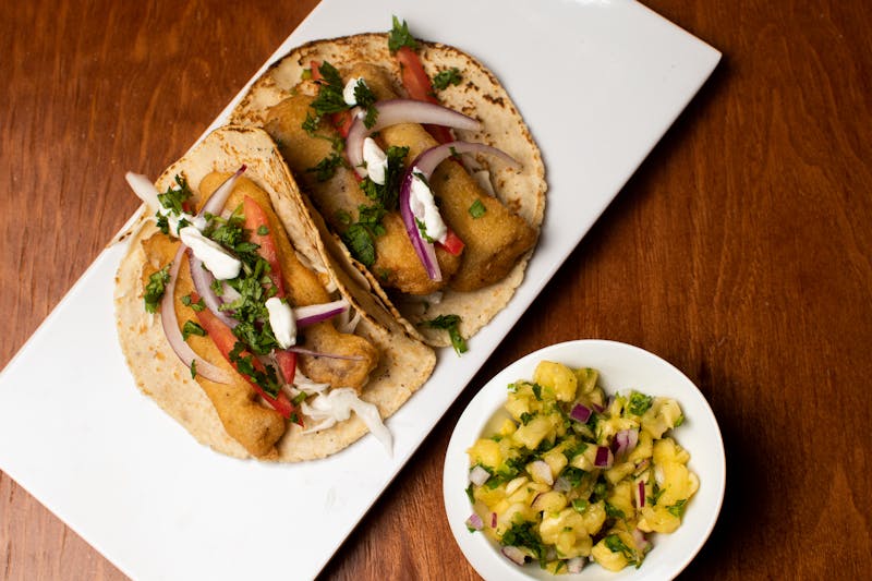 Crispy fish tacos with mango salsa